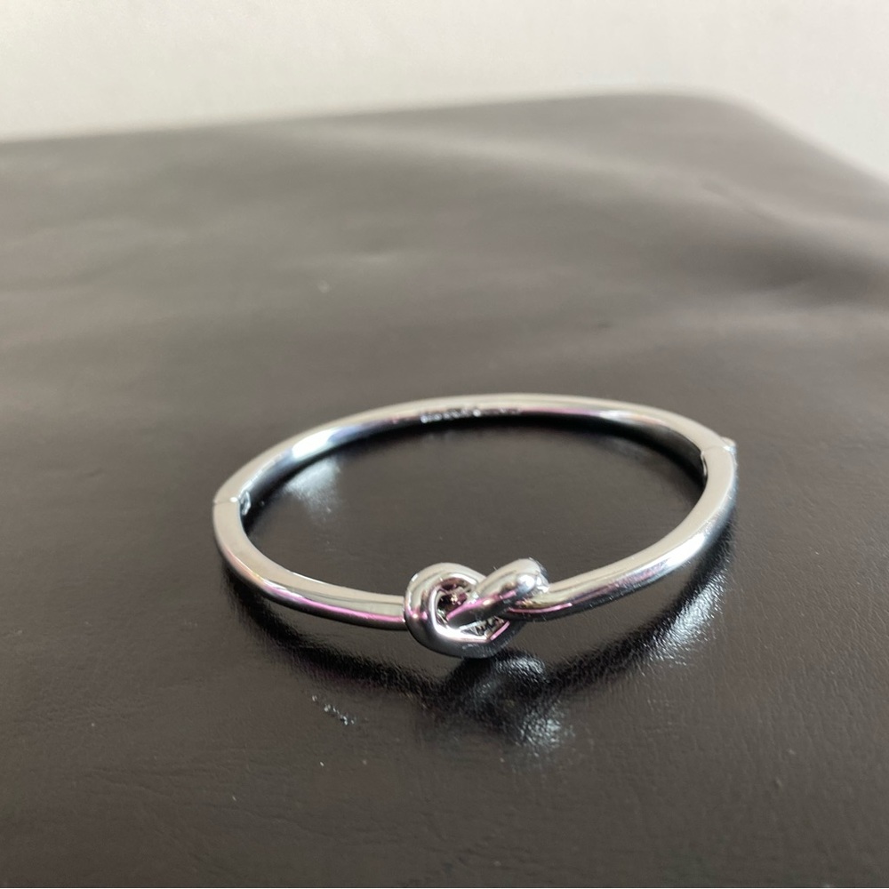 Love Me Knot Kate Spade bracelet Silvertone Banggle